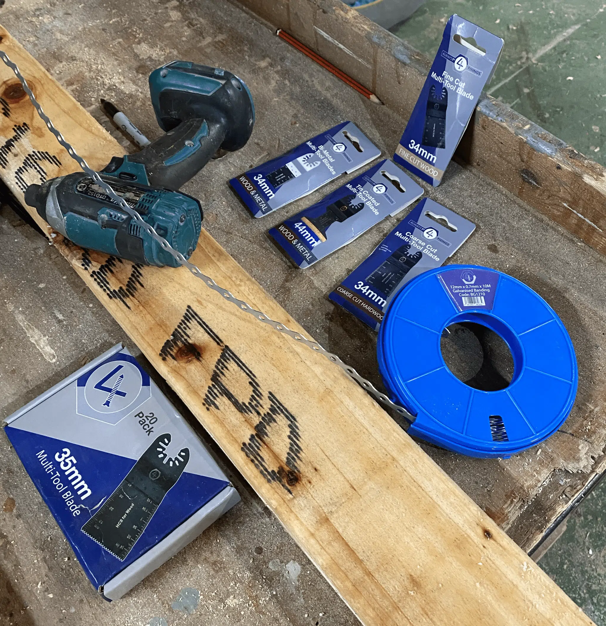 Galvanised banding and Multi Tool Blades on bench