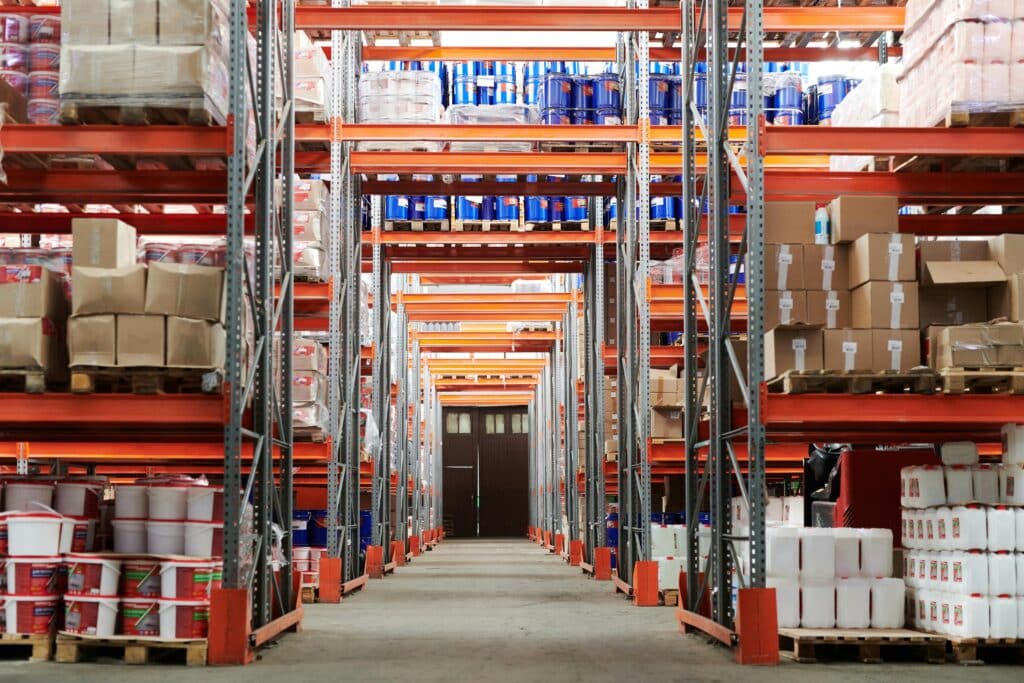 Warehouse with stocked shelves and boxes.
