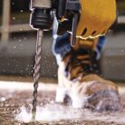 Dewalt SDS Drill and bit drilling hole