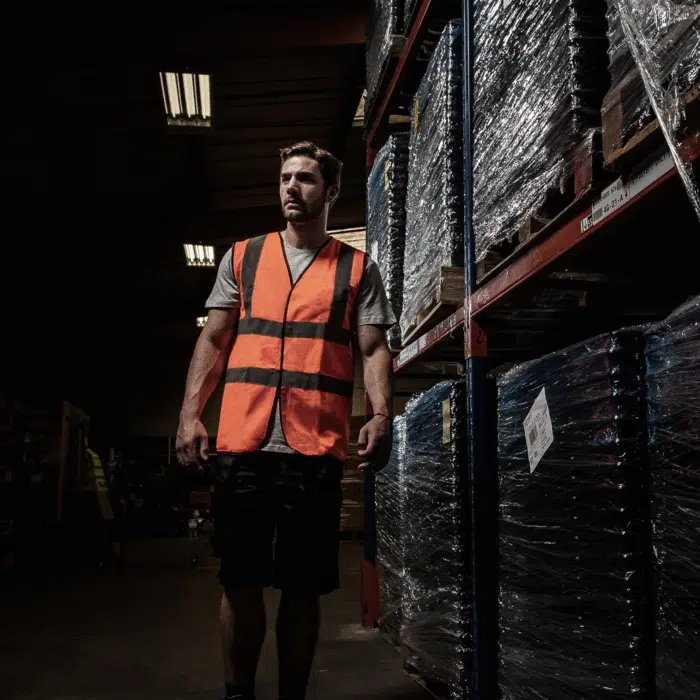 Orange hi vis vest being worn