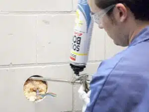 Plasterboard adhesive hole fill